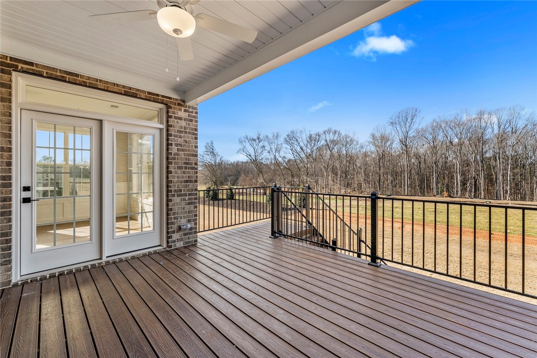 103 Wagner Court Easley, SC 29642 - Photo 33 of 36 This spacious covered deck offers scenic outdoor living with direct access indoors.