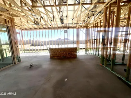 a view of a porch with a floor to ceiling window