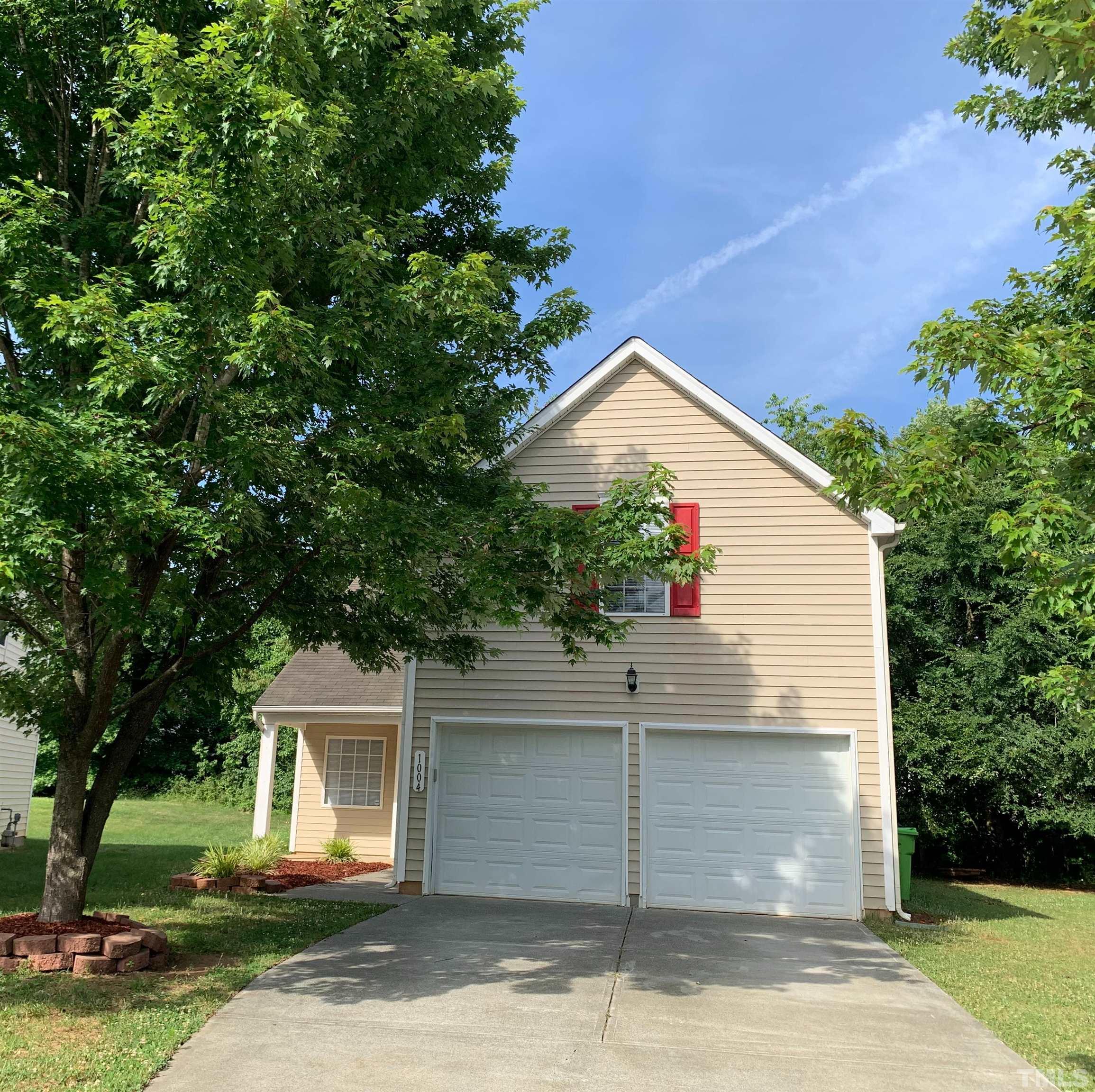 1004 Lombar Street Raleigh, NC 27610 - Photo 1 of 34 a view of a house with a yard