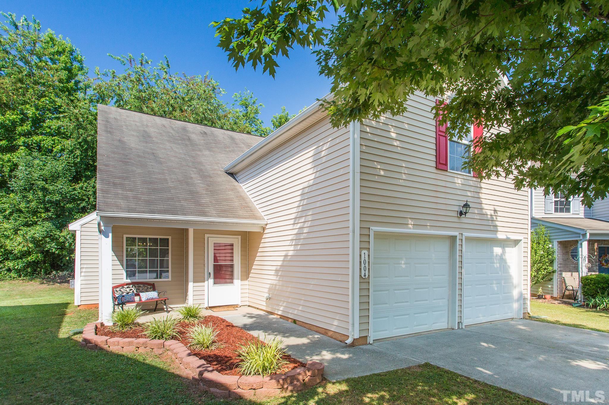1004 Lombar Street Raleigh, NC 27610 - Photo 33 of 34 front view of a house with a yard