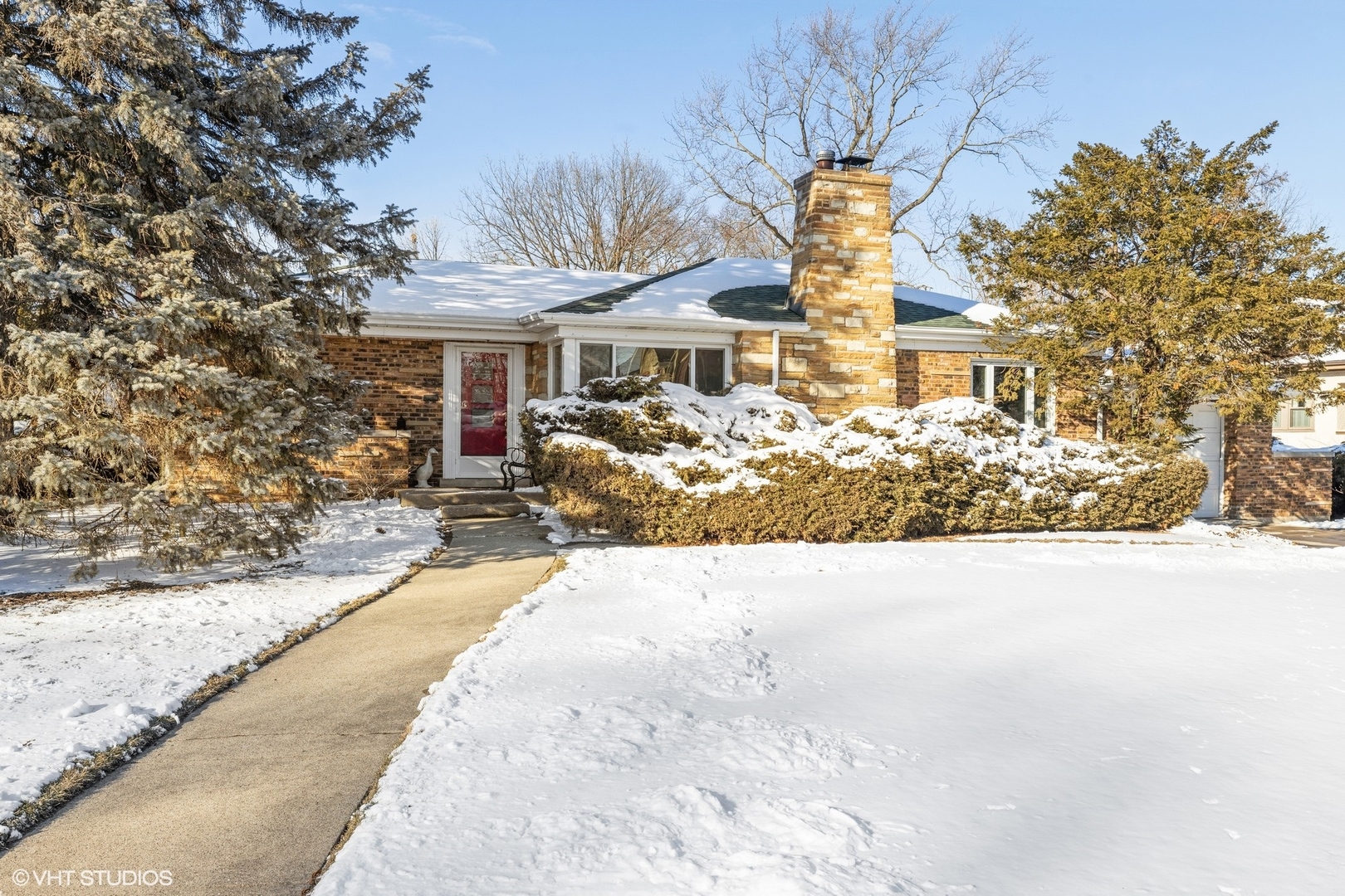 356 Herrick Road Riverside, IL 60546 - Photo 1 of 26 a front view of a house with garden