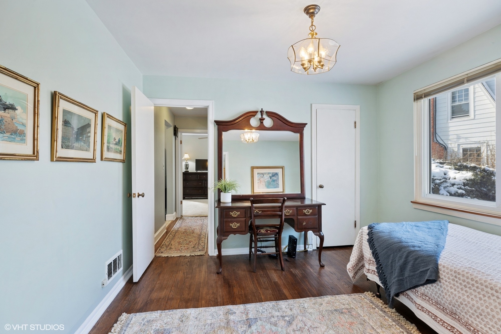 356 Herrick Road Riverside, IL 60546 - Photo 15 of 26 a view of a livingroom with furniture a chandelier and wooden floor