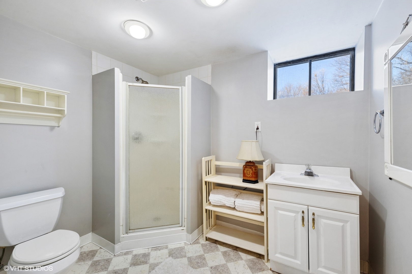 356 Herrick Road Riverside, IL 60546 - Photo 18 of 26 a bathroom with a sink toilet and shower