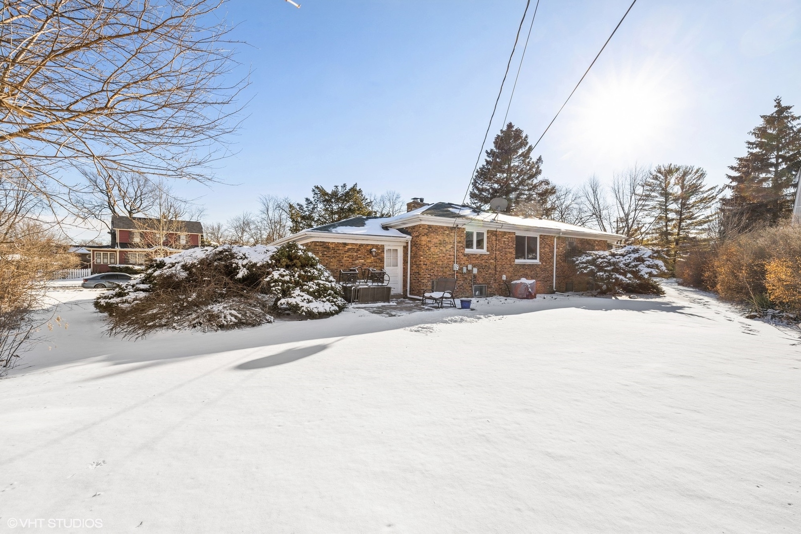 356 Herrick Road Riverside, IL 60546 - Photo 20 of 26 a front view of a house with a yard and covered with snow