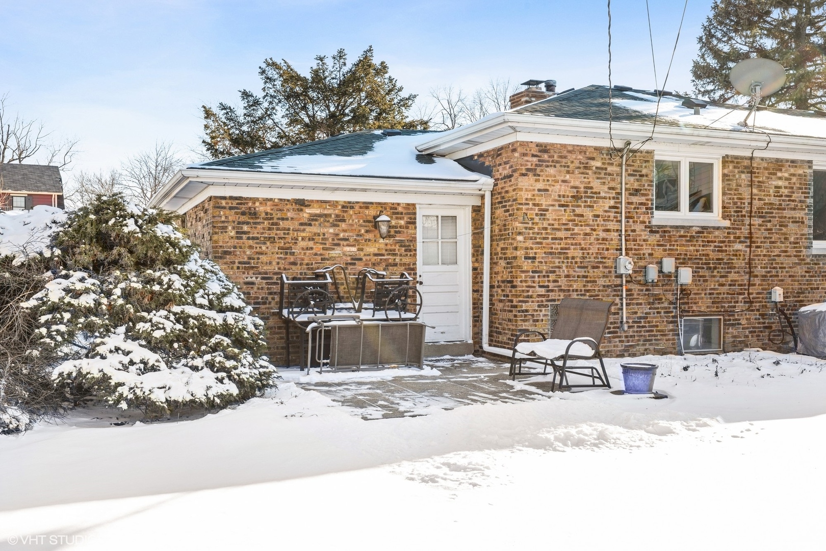 356 Herrick Road Riverside, IL 60546 - Photo 22 of 26 a view of a house with a snow on the road