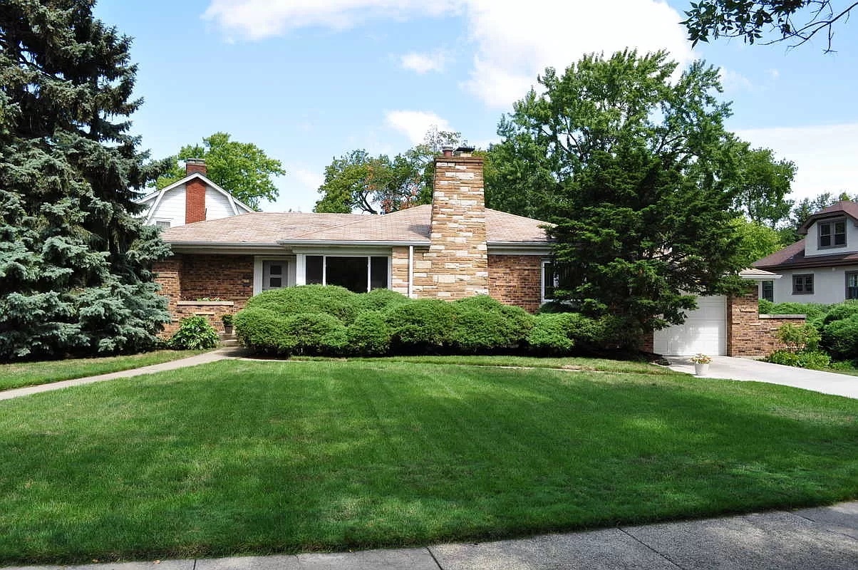 356 Herrick Road Riverside, IL 60546 - Photo 23 of 26 a front view of a house with a yard