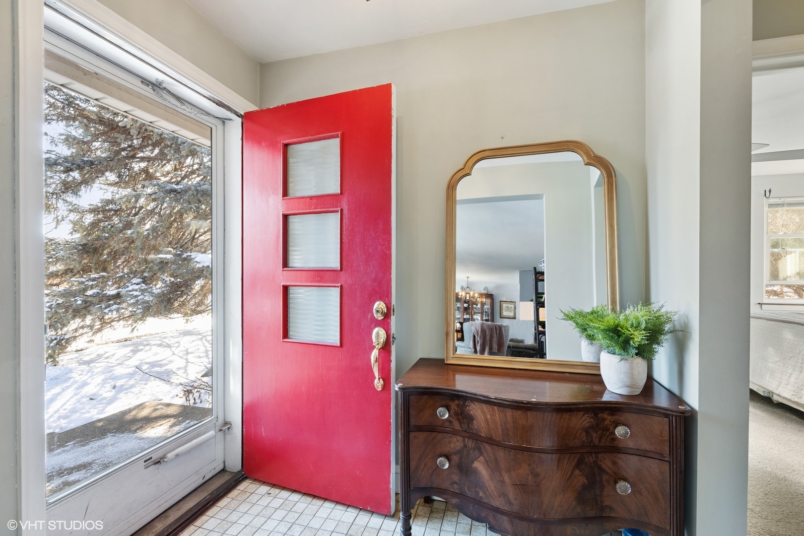 356 Herrick Road Riverside, IL 60546 - Photo 3 of 26 a bathroom with a sink a mirror and a window