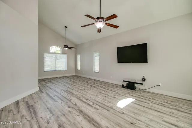 a view of a livingroom with a flat screen tv
