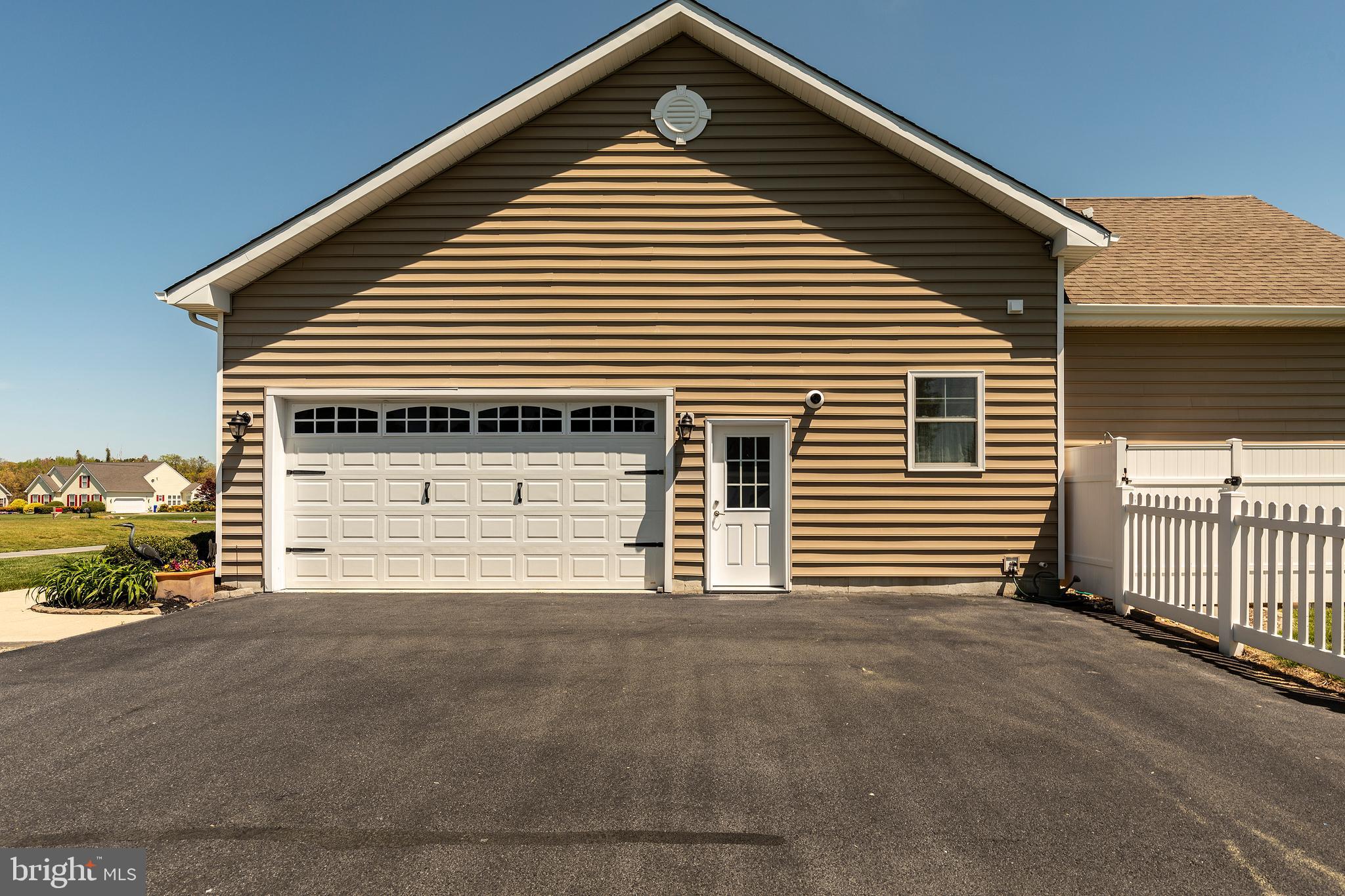 30441 Half Shell Road Milton, DE 19968 - Photo 5 of 70 Side Entry Garage & utility door