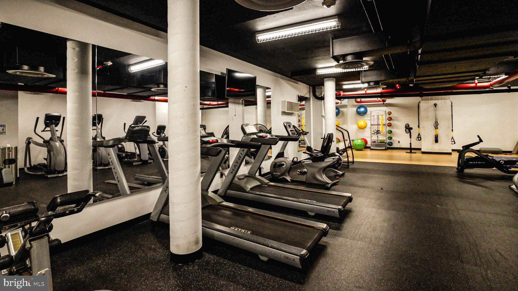 1245 4th Street Southwest, Unit E106 Washington, DC 20024 - Photo 15 of 33 a view of a room with gym equipment