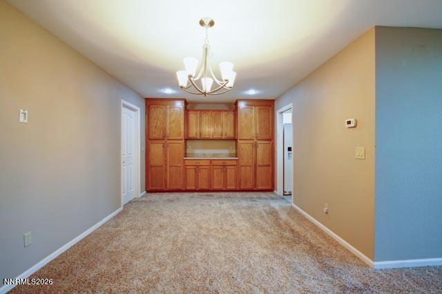 2640 Rockview Drive Reno, NV 89519 - Photo 29 of 56 a view of a room with a chandelier fan and windows