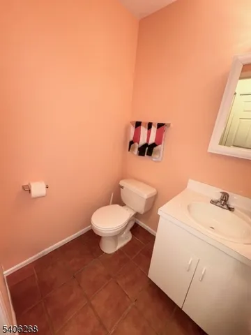 a bathroom with a toilet and a sink