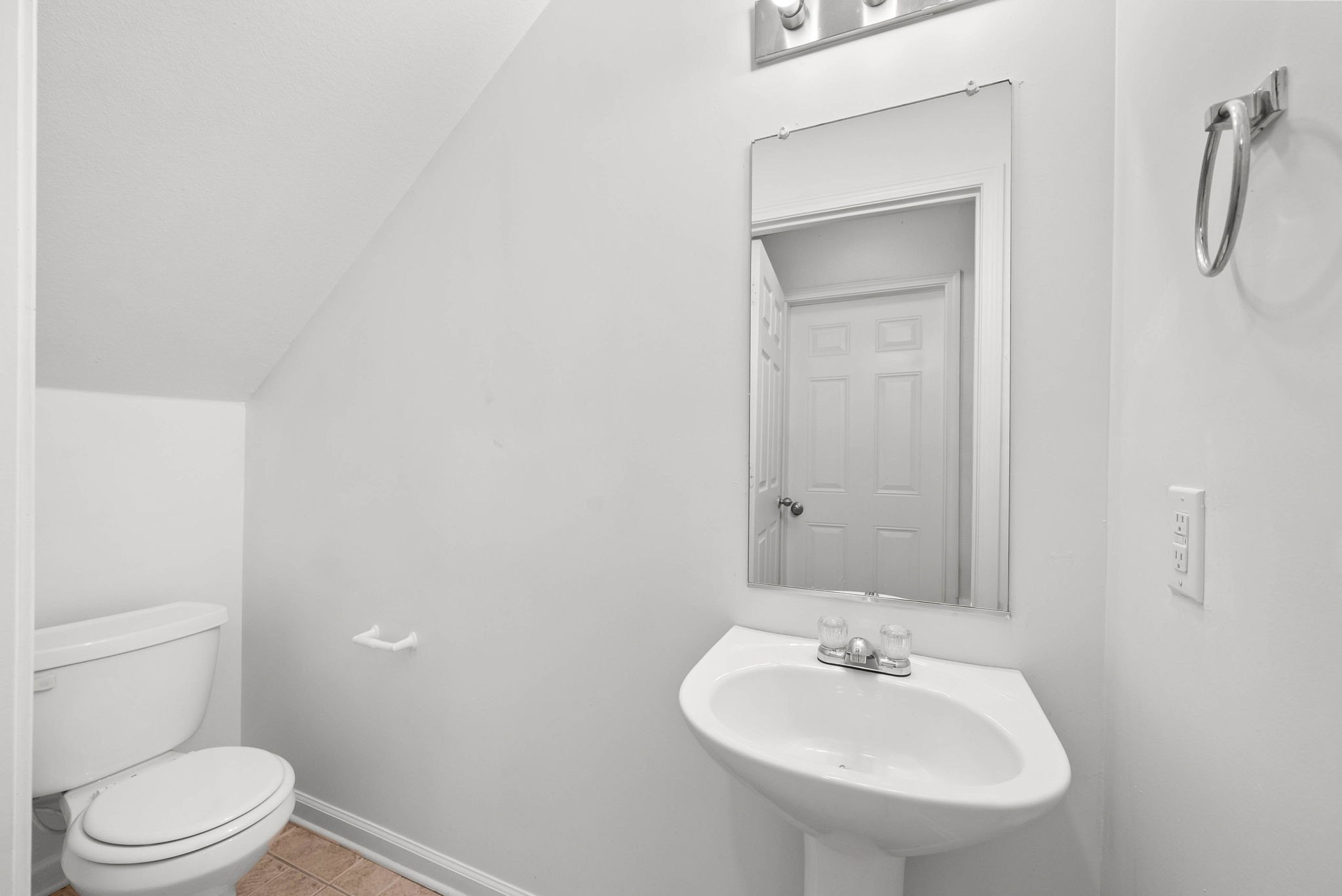 535 Lafayette Road, Unit F Clarksville, TN 37042 - Photo 12 of 26 a bathroom with a sink toilet and mirror