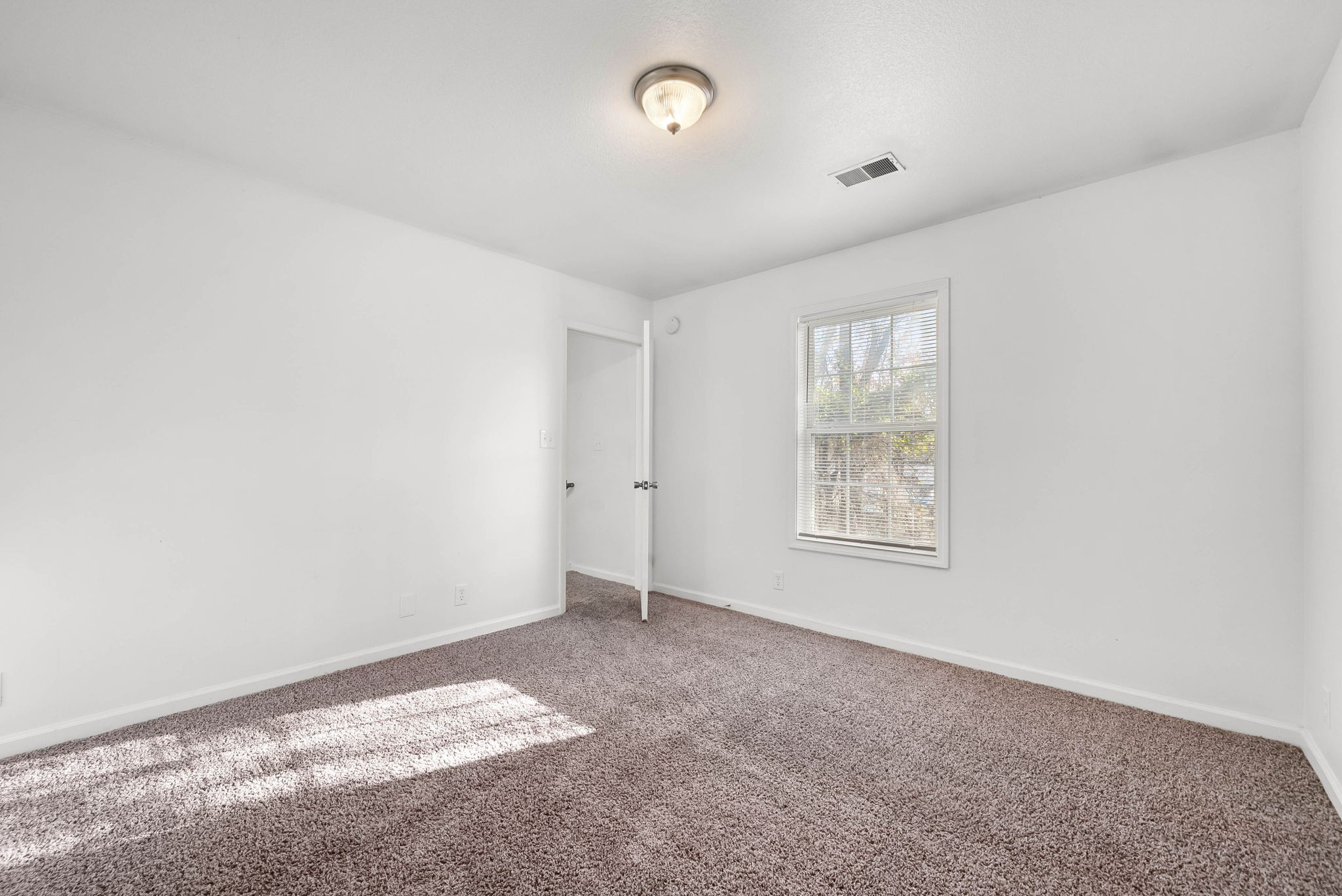 535 Lafayette Road, Unit F Clarksville, TN 37042 - Photo 15 of 26 a view of an empty room with a window