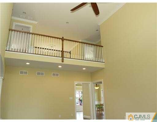 1028 New Durham Road Edison, NJ 08817 - Photo 14 of 16 a view of a hallway with entryway