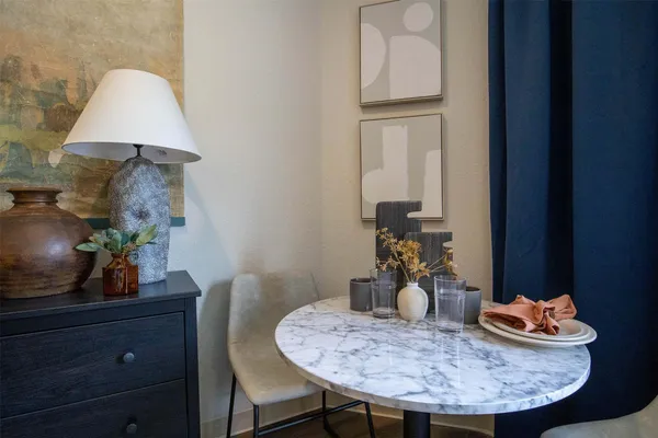 a view of a dining room with furniture
