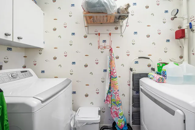 a bathroom with a sink toilet and a bath tub