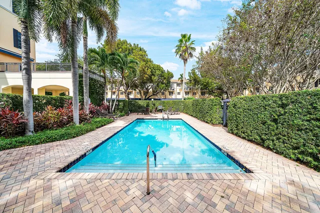 a view of swimming pool with a patio