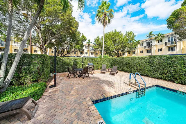a view of a backyard with a patio