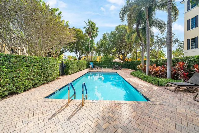 a view of swimming pool with a patio