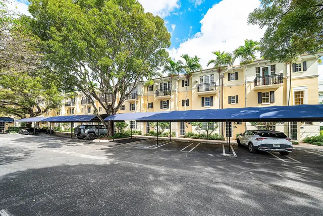 a view of a street with cars