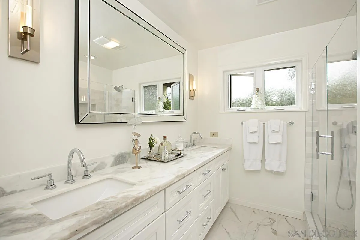 1465 Rodeo Drive La Jolla, CA 92037 - Photo 20 of 24 a bathroom with a double vanity sink mirror and double