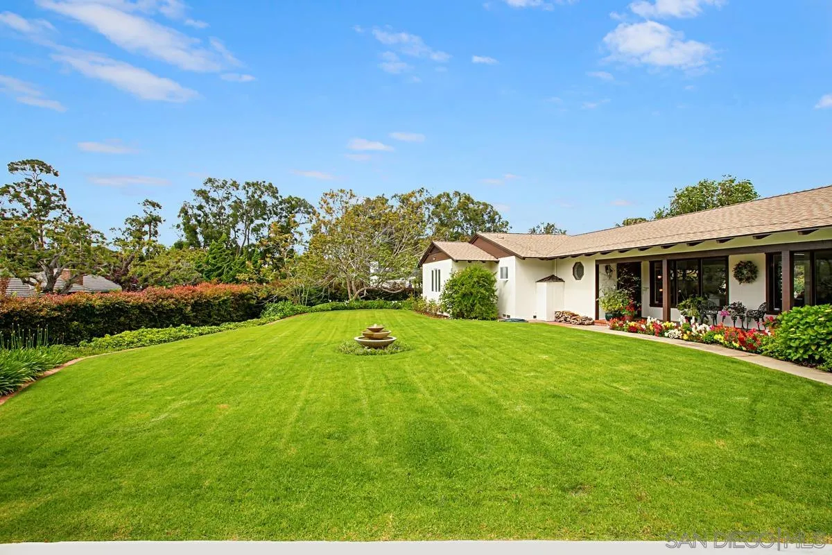 1465 Rodeo Drive La Jolla, CA 92037 - Photo 4 of 24 a view of a house with backyard and garden
