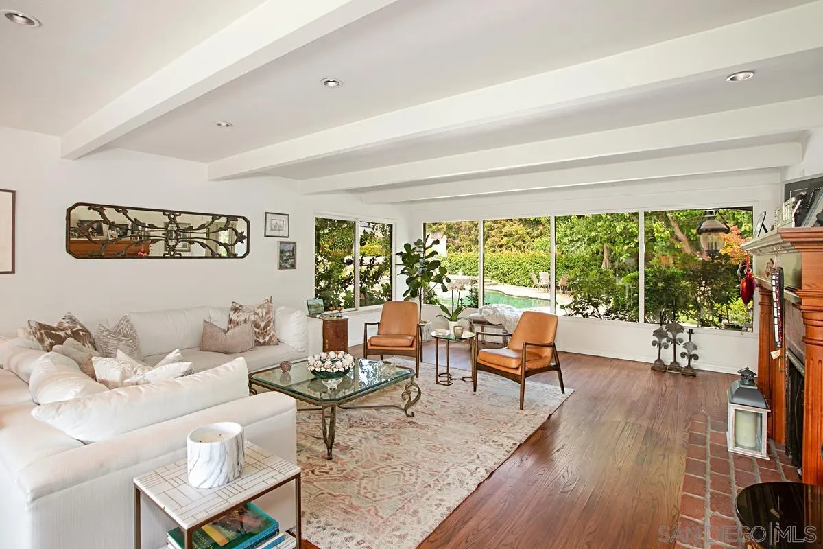1465 Rodeo Drive La Jolla, CA 92037 - Photo 8 of 24 a living room with furniture and a large window