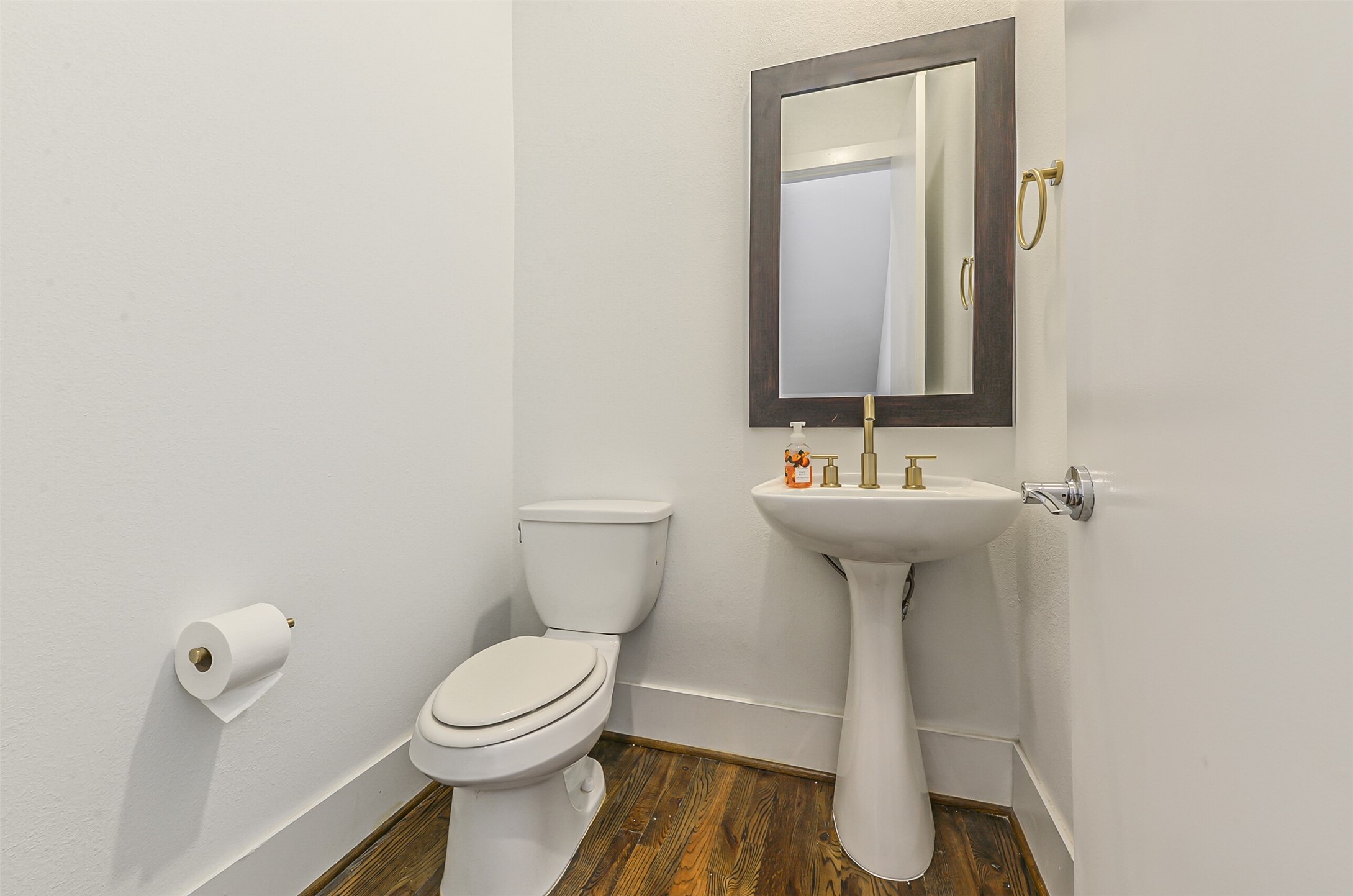2715 Cohn Garden Lane Houston, TX 77007 - Photo 17 of 23 a bathroom with a sink toilet and mirror
