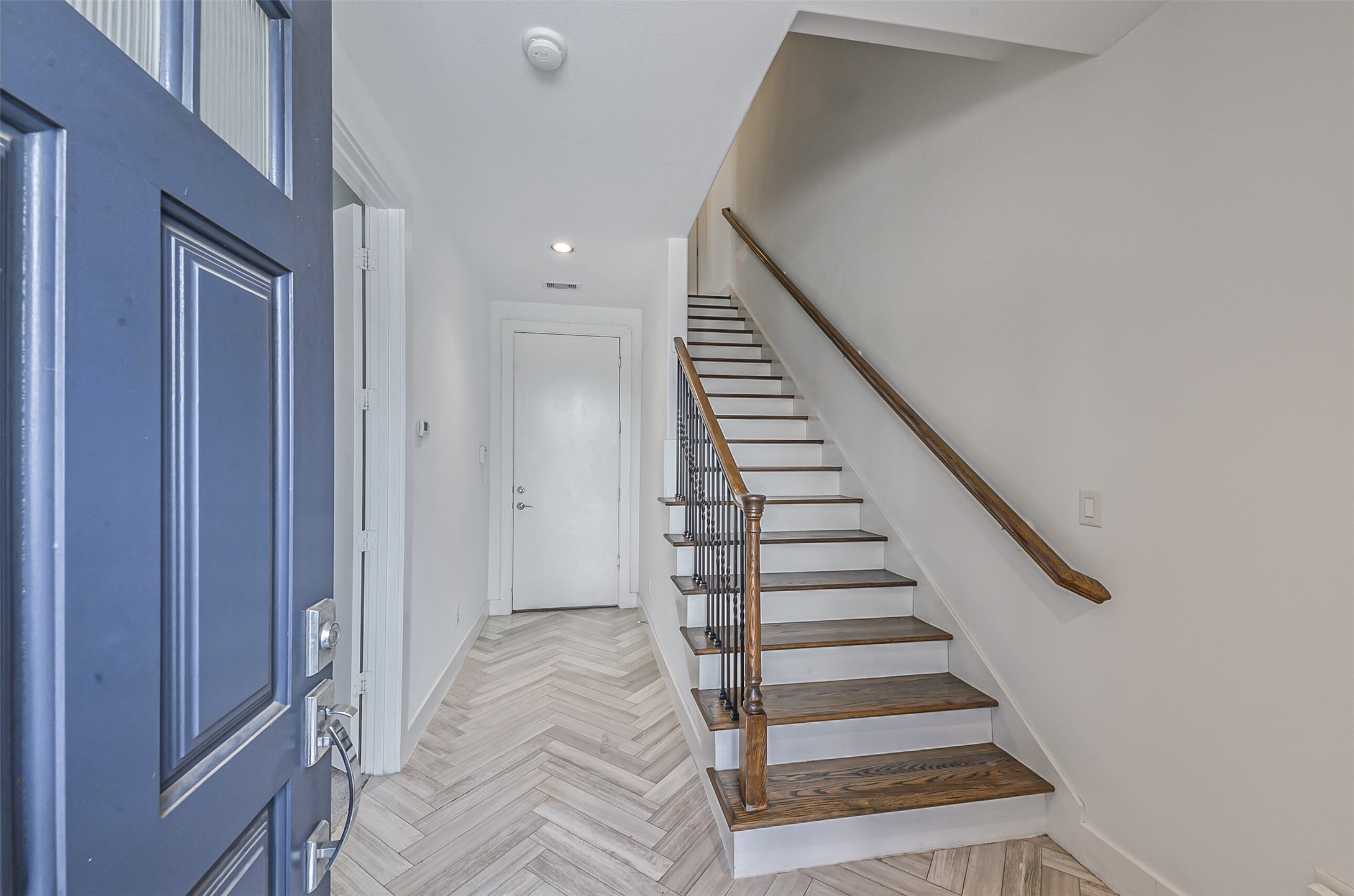 2715 Cohn Garden Lane Houston, TX 77007 - Photo 5 of 23 a view of entryway and hall with wooden floor