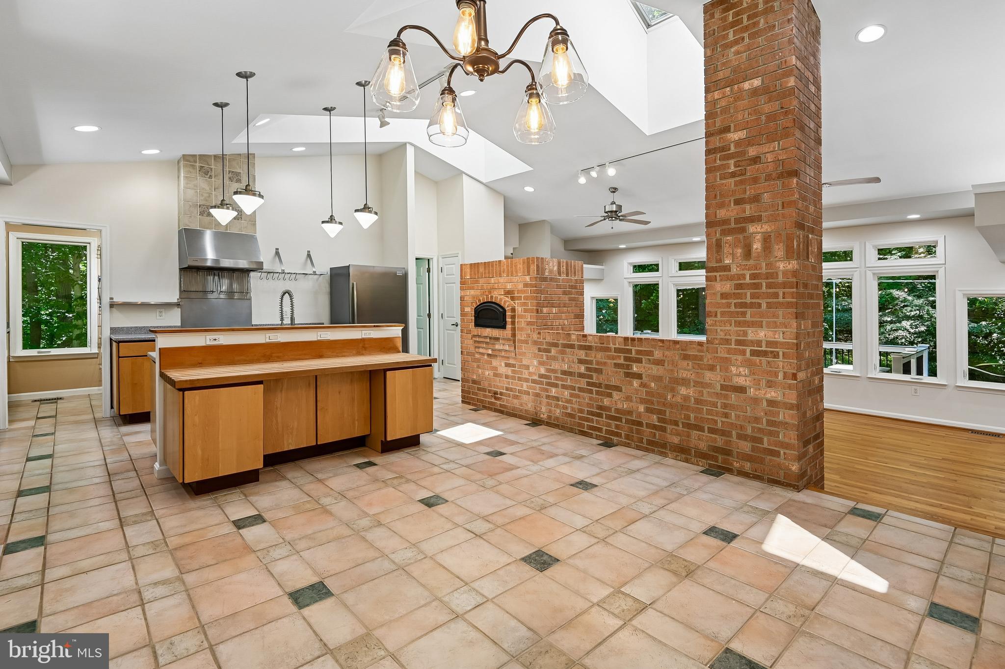 3633 Patuxent River Road Davidsonville, MD 21035 - Photo 7 of 85 Dining Area & Kitchen Ideal for Hosting Gatherings