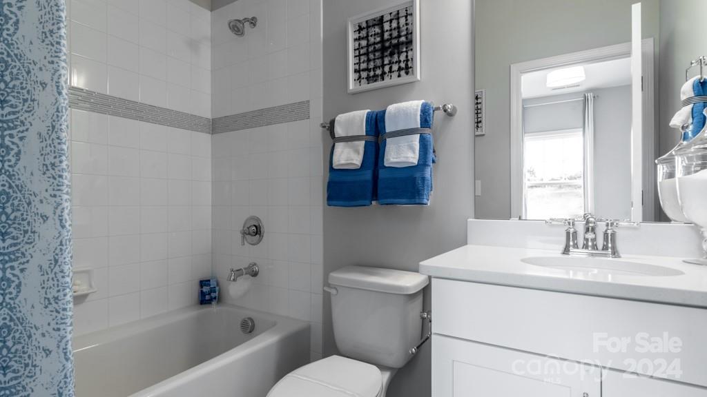 1237 Sugar Crk Road Indian Land, SC 29707 - Photo 21 of 25 a bathroom with a toilet sink and mirror