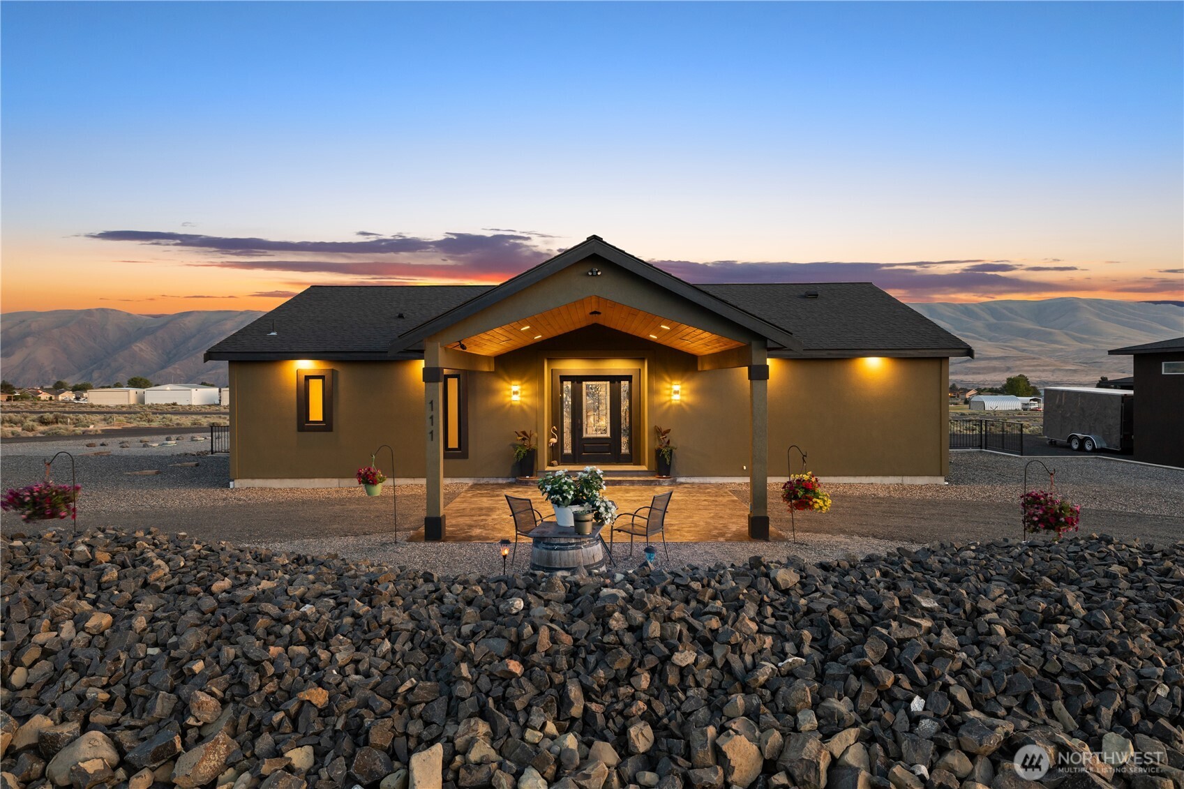 111 Wren Loop Southwest Mattawa, WA 99349 - Photo 1 of 40 a view of a swimming pool with an outdoor seating