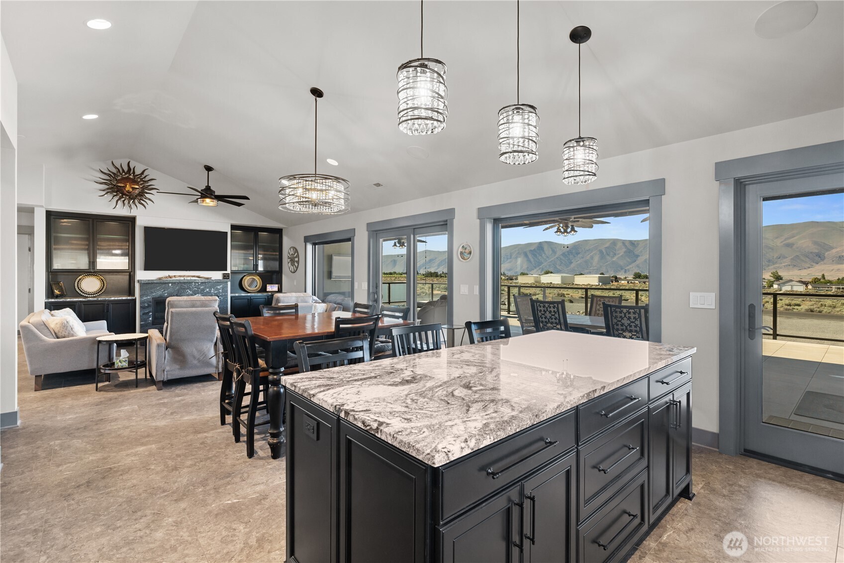 111 Wren Loop Southwest Mattawa, WA 99349 - Photo 12 of 40 a large kitchen with sink and center island