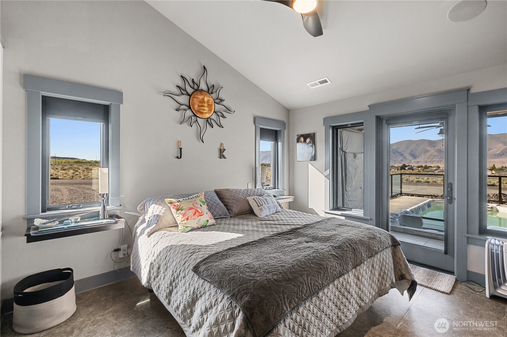 111 Wren Loop Southwest Mattawa, WA 99349 - Photo 14 of 40 a bedroom with a bed and a painting on the wall