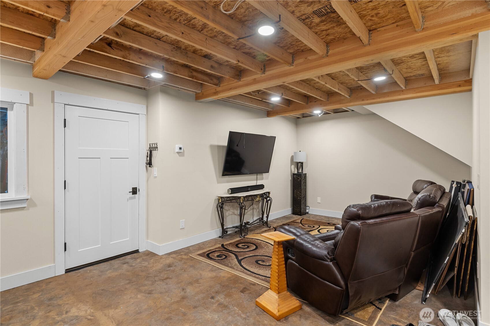 111 Wren Loop Southwest Mattawa, WA 99349 - Photo 24 of 40 a living room with furniture and a flat screen tv
