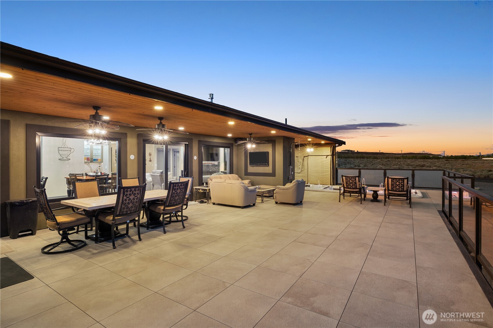 111 Wren Loop Southwest Mattawa, WA 99349 - Photo 28 of 40 a living room with couches and pool view with the view of swimming pool