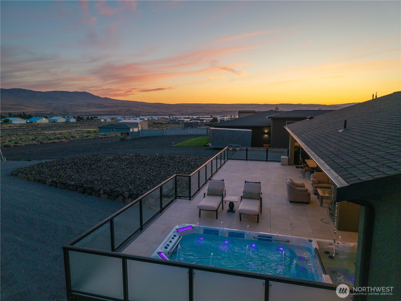 111 Wren Loop Southwest Mattawa, WA 99349 - Photo 29 of 40 a view of a balcony with two chairs and a potted plant