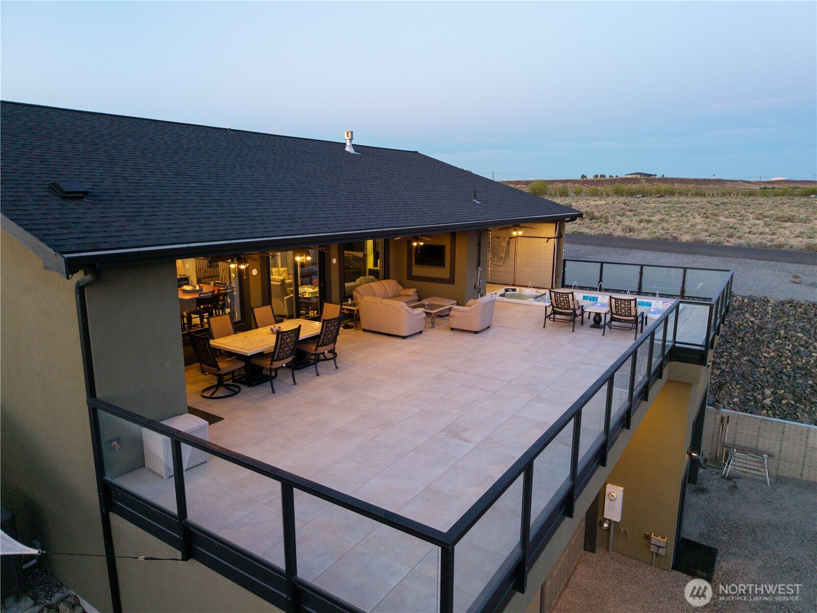 111 Wren Loop Southwest Mattawa, WA 99349 - Photo 30 of 40 a roof deck with table and chairs