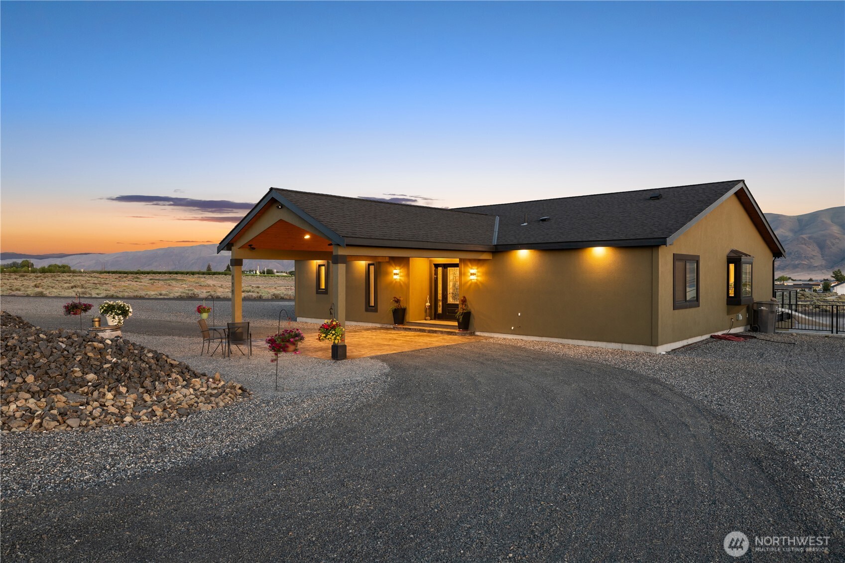 111 Wren Loop Southwest Mattawa, WA 99349 - Photo 33 of 40 a view of a house with outdoor space and sitting area