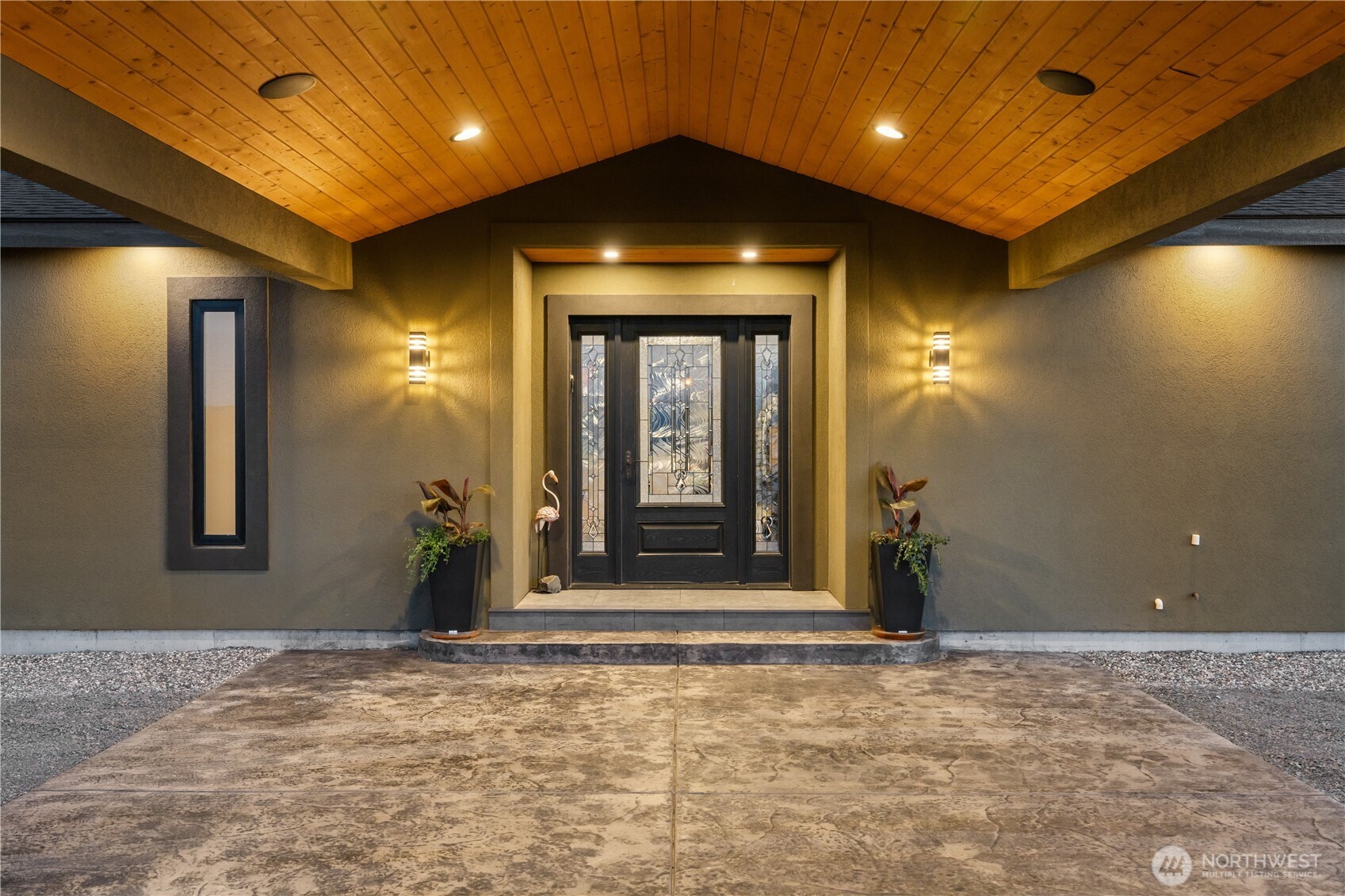 111 Wren Loop Southwest Mattawa, WA 99349 - Photo 4 of 40 a view of a hallway with wooden floor and a living room