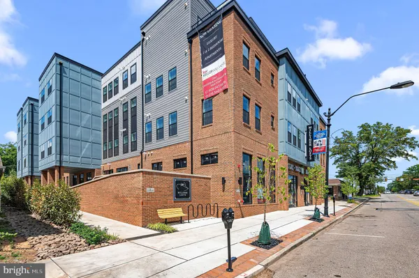 a front view of a building with street view