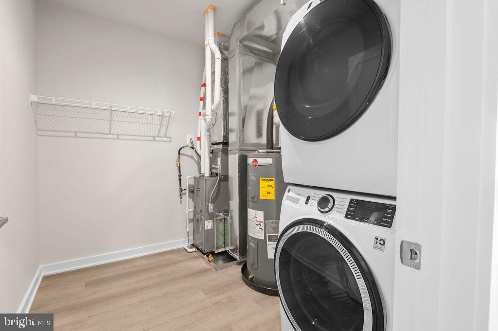 26 South York Road, Unit 210 Hatboro, PA 19040 - Photo 9 of 52 a utility room with dryer and washer