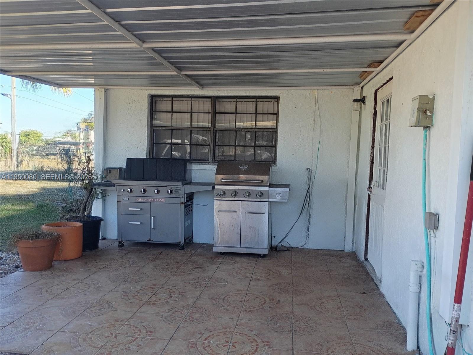 1824 Red Road Clewiston, FL 33440 - Photo 17 of 27 a utility room with dryer and washer