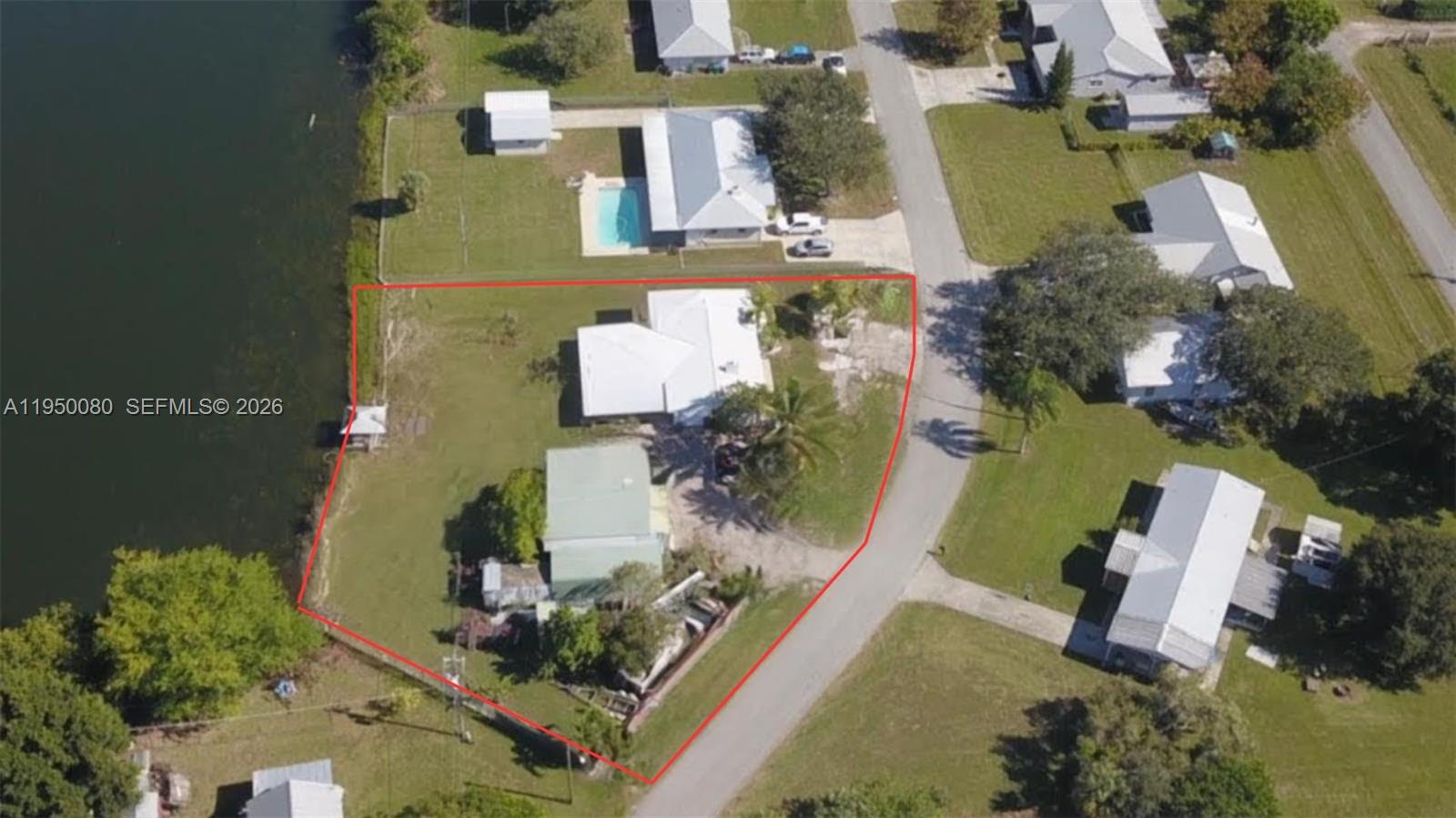 1824 Red Road Clewiston, FL 33440 - Photo 26 of 27 an aerial view of a house with outdoor space