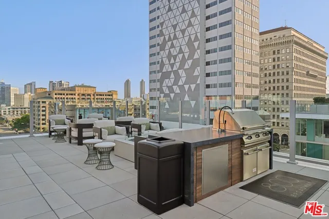 a utility room with multiple dryer and washer