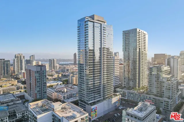 a view of city with tall buildings