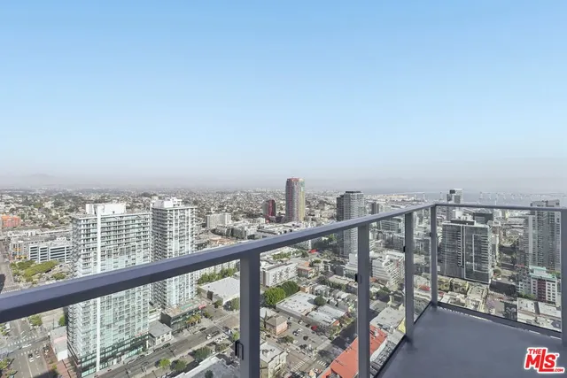 a view of a city skyline from a balcony