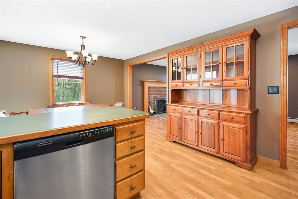 20 Upper Hampden Road Monson, MA 01057 - Photo 11 of 39 a kitchen with stainless steel appliances granite countertop a stove a sink and a refrigerator