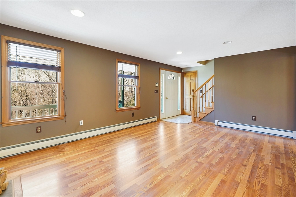 20 Upper Hampden Road Monson, MA 01057 - Photo 15 of 39 a view of an empty room with wooden floor and a window